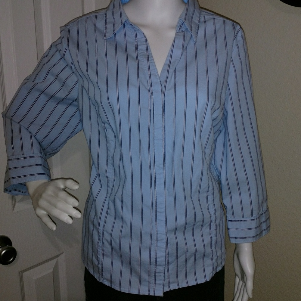 Tailored, button down suit shirt.
